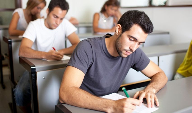student writing ielts exam